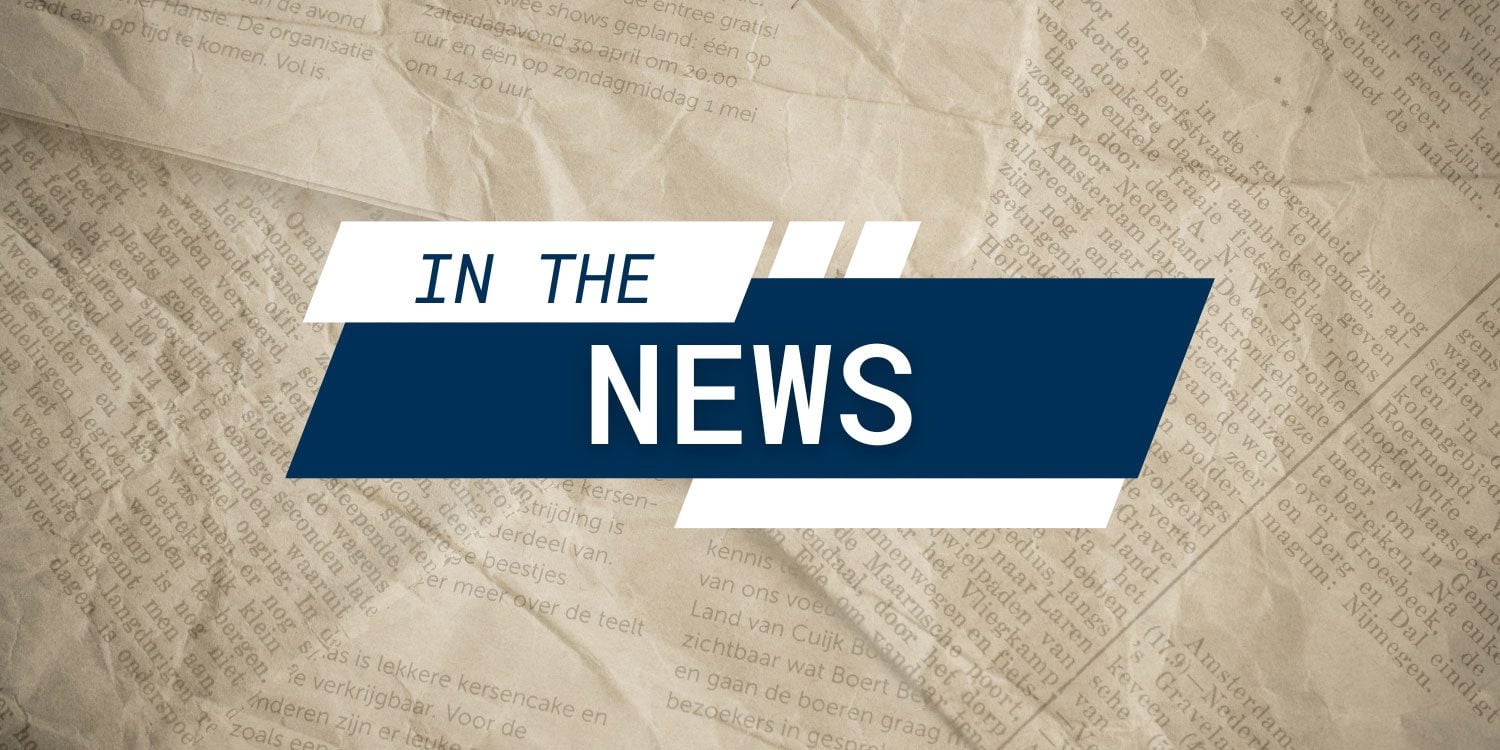 Graphic with "IN THE NEWS" over crumpled newspaper.